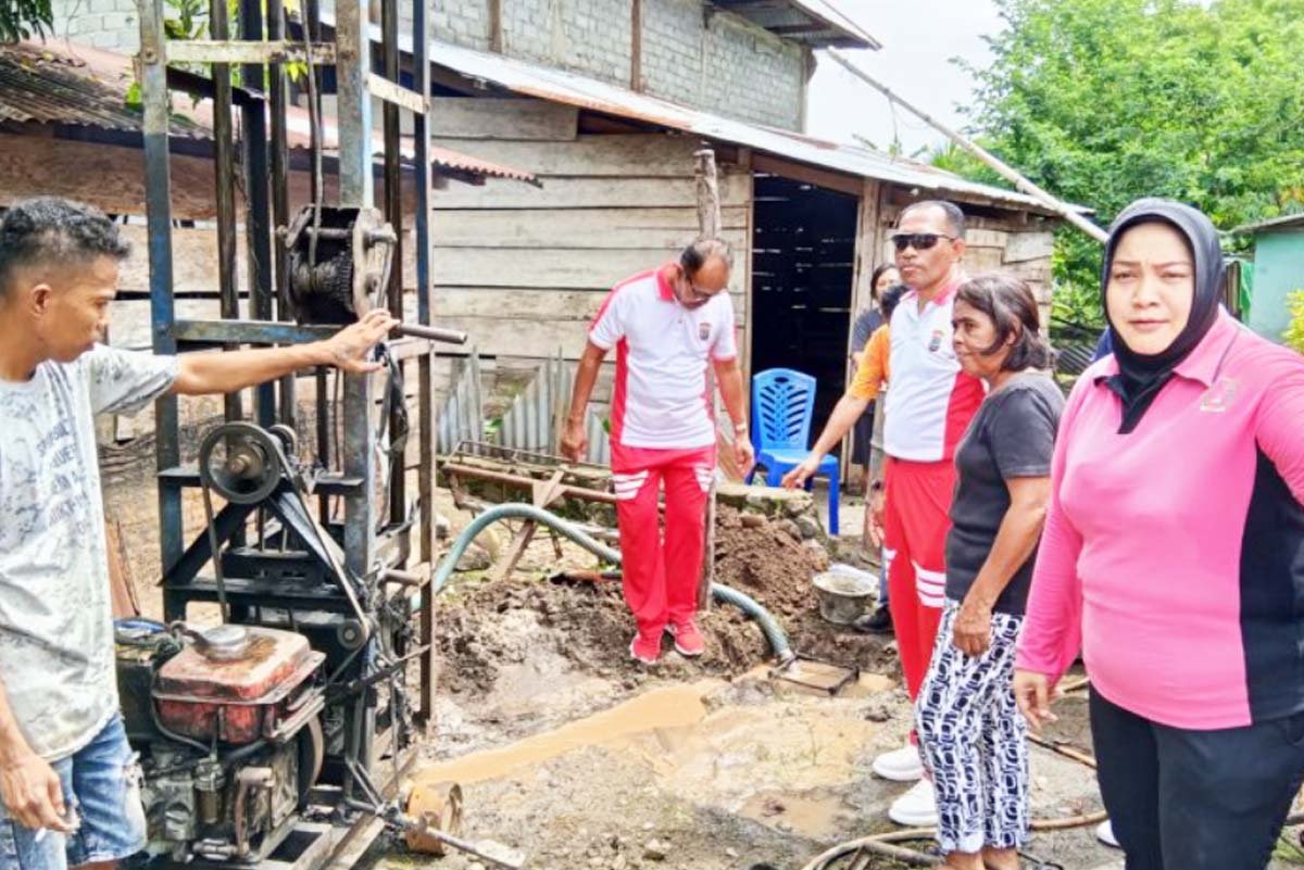 Polres Bolmong Gelar Bansos Air Bersih